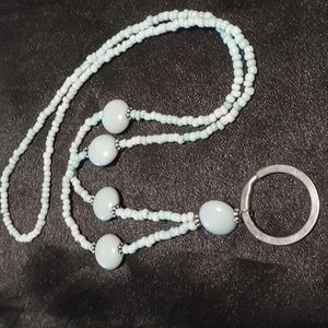 Beaded lanyard 34 inch s long glass seed beads larger resin beads. Key ring.